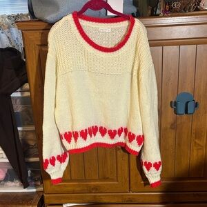 Vintage-Inspired Heart Pattern Knit Sweater with Red Trim Size Large